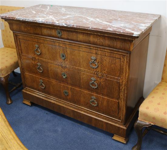 A French walnut and marble topped commode W.124cm